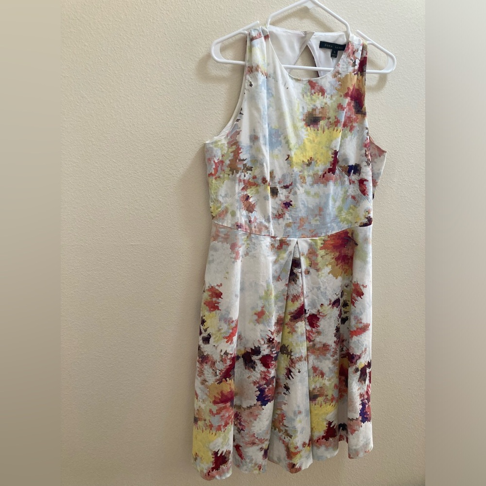 Cute colorful dress with lots of pretty details. 
Size XL 12/14